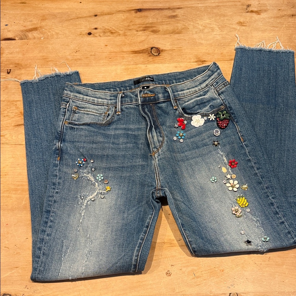 Aqua - Embellished Blue Jeans. Size 29 -27” inseam. Frayed bottom.